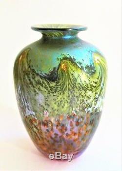A Signed 1989 norman stuart clarke iridescent art glass vase