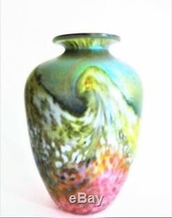 A Signed 1989 norman stuart clarke iridescent art glass vase