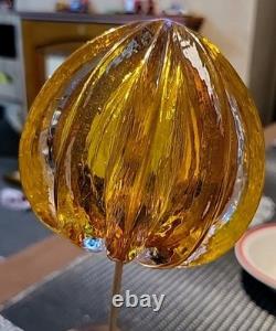 Amber Glass. Hole At Base. Signed On Top. Tiny Glitters Like Inside. Not Known To Me