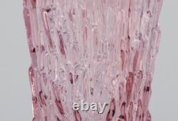 Art glass vase, Central Europe. Tall and slim vase in purple glass