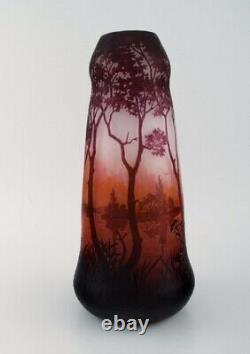 Daum Nancy, France. Large antique vase in art glass with lake landscape