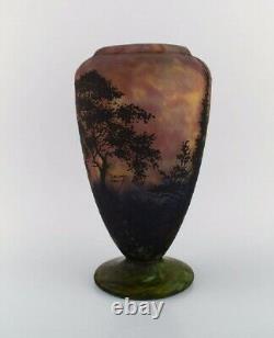 Daum Nancy, France. Large vase in mouth blown art glass decorated with landscape