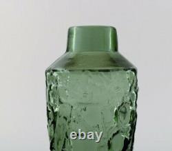Finnish glass artist. Vase in green mouth blown art glass. Abstract motif
