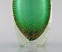 Murano, Italy. Vase in green mouth-blown art glass with bubbles