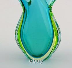 Murano vase in turquoise mouth blown art glass. Italian design, 1960's