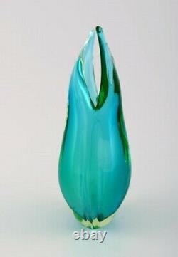 Murano vase in turquoise mouth blown art glass. Italian design, 1960's