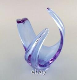 Scandinavian glass artist. Vase / bowl in light blue mouth blown art glass