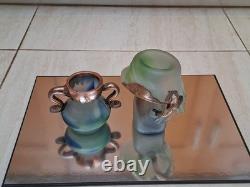 Verre d’atelier avec recouvrement en cuivre massif. Deux pièces signées par l’artiste