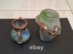 Verre d’atelier avec recouvrement en cuivre massif. Deux pièces signées par l’artiste